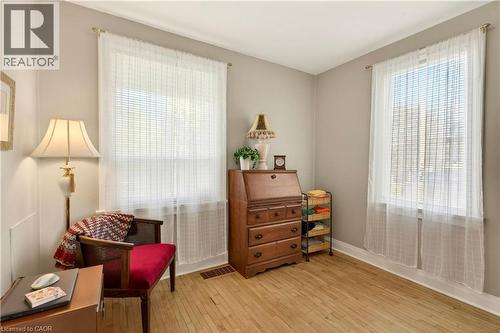 Living area featuring hardwood / wood-style flooring and plenty of natural light - 944 Garth Street, Hamilton, ON - Indoor