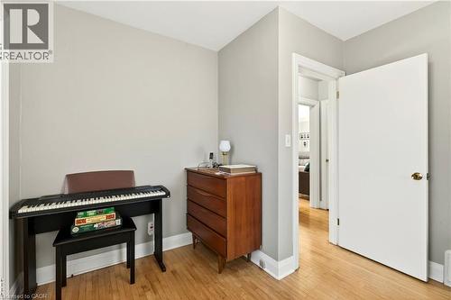 Sitting room featuring light wood-type flooring and baseboards - 944 Garth Street, Hamilton, ON - Indoor