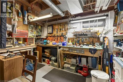 Miscellaneous room with concrete flooring and a workshop area - 944 Garth Street, Hamilton, ON - Indoor Photo Showing Other Room