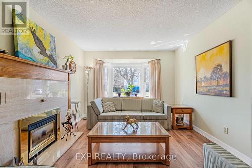 78 Esther Avenue, Cambridge, ON - Indoor Photo Showing Living Room With Fireplace