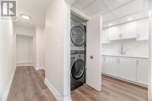 104 - 1225 North Shore Boulevard E, Burlington, ON - Indoor Photo Showing Laundry Room