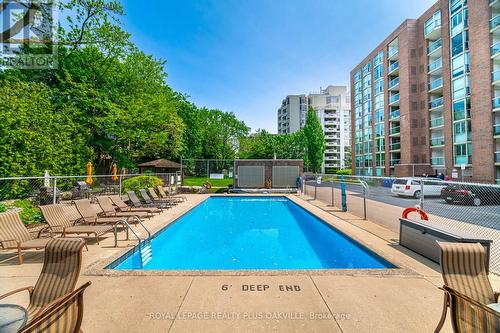 104 - 1225 North Shore Boulevard E, Burlington, ON - Outdoor With In Ground Pool