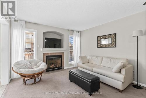 862 Stark Circle, Milton, ON - Indoor Photo Showing Living Room With Fireplace