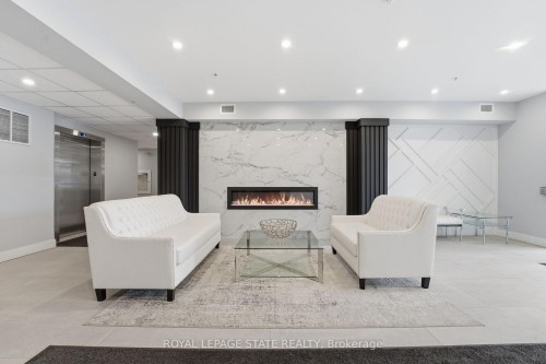 203-120 Springvalley Crescent, Hamilton, ON - Indoor With Fireplace