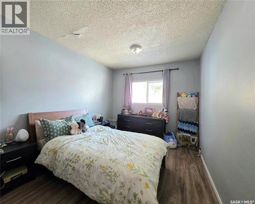 311 5Th Avenue E, Melville, SK - Indoor Photo Showing Bedroom