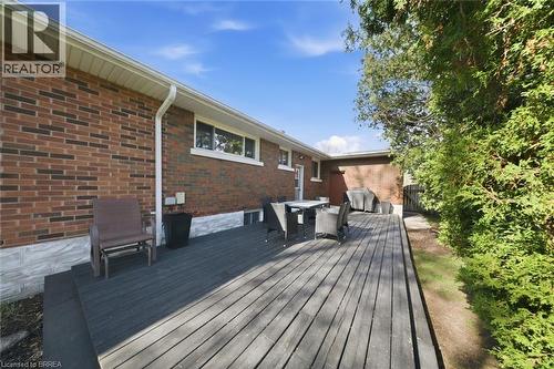 Expansive wooden deck featuring ample space for outdoor furnishings - 71 Pinecrest Drive, Kitchener, ON - Outdoor With Deck Patio Veranda