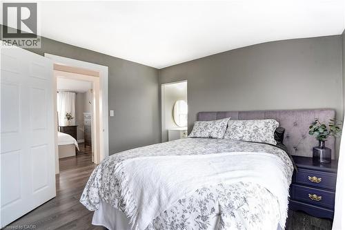 Bedroom with dark wood-type flooring - 23247 Beattie Line, Elgin, ON - Indoor Photo Showing Bedroom
