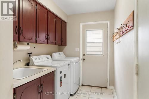 Laundry and garage access on main floor - 64 Adel Drive, St. Catharines (Carlton/Bunting), ON - Indoor Photo Showing Laundry Room