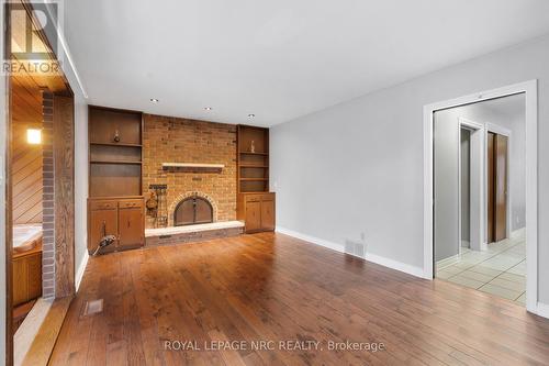 Wood burning fire place - 64 Adel Drive, St. Catharines (Carlton/Bunting), ON - Indoor With Fireplace