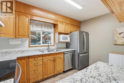 111 103 Keevil Crescent, Saskatoon, SK - Indoor Photo Showing Kitchen With Double Sink