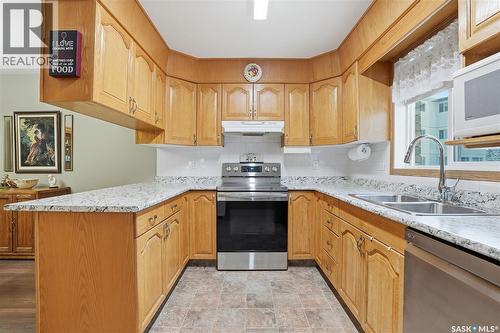 111 103 Keevil Crescent, Saskatoon, SK - Indoor Photo Showing Kitchen With Double Sink