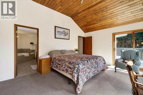 7905 97A Highway, Mara, BC - Indoor Photo Showing Bedroom