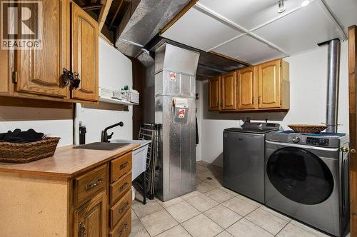 7905 97A Highway, Mara, BC - Indoor Photo Showing Laundry Room