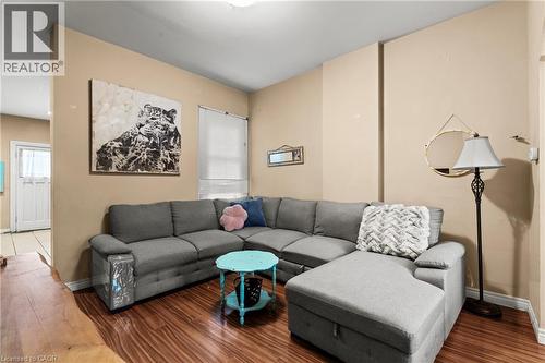 Living area with stairway and wood finished floors - 78 Clyde Street, Hamilton, ON - Indoor Photo Showing Living Room
