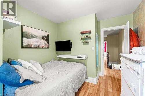 Bedroom with light wood finished floors and a closet - 78 Clyde Street, Hamilton, ON - Indoor Photo Showing Bedroom