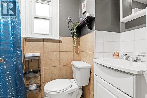 Bedroom with light wood-style floors and baseboards - 78 Clyde Street, Hamilton, ON - Indoor Photo Showing Bedroom