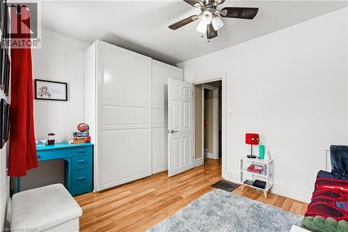 Bedroom featuring light wood-style flooring and baseboards - 78 Clyde Street, Hamilton, ON - Indoor