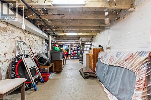 Unfinished below grade area with independent washer and dryer and a sink - 78 Clyde Street, Hamilton, ON - Indoor Photo Showing Basement