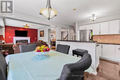 56 Lockheed Crescent, Brampton, ON - Indoor Photo Showing Dining Room With Fireplace