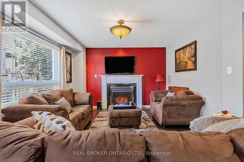 56 Lockheed Crescent, Brampton, ON - Indoor Photo Showing Living Room With Fireplace