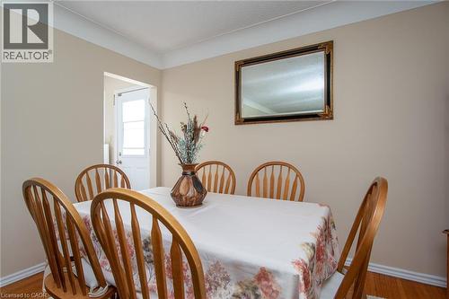Dining space featuring baseboards and light wood-type flooring - 129 River Road E, Kitchener, ON - Indoor Photo Showing Dining Room