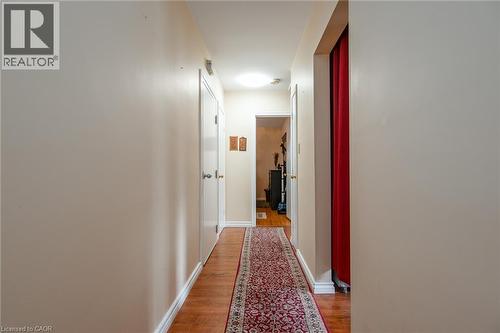 Hall with light wood-style flooring and baseboards - 129 River Road E, Kitchener, ON - Indoor Photo Showing Other Room
