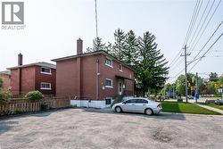 View of property exterior with a chimney - 
