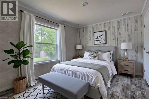 Bedroom featuring ornamental molding and wood finished floors - 77 Park Lane, Flamborough, ON - Indoor Photo Showing Bedroom