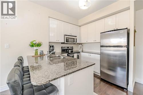 170 Water Street N Unit# 807, Cambridge, ON - Indoor Photo Showing Kitchen With Double Sink
