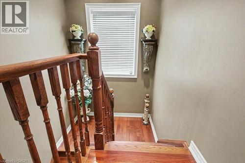 Staircase with wood finished floors and baseboards - 284 Normanhurst Avenue, Hamilton, ON - Indoor Photo Showing Other Room