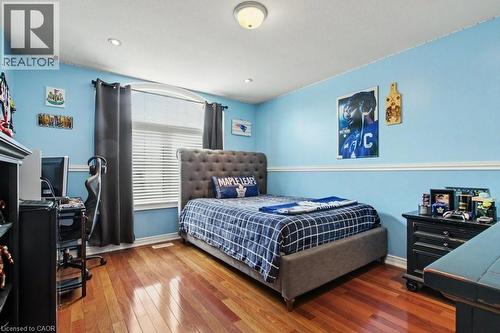Bedroom featuring hardwood / wood-style floors and a desk - 284 Normanhurst Avenue, Hamilton, ON - Indoor Photo Showing Bedroom