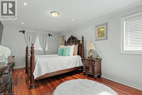 Bedroom with wood finished floors and crown molding - 284 Normanhurst Avenue, Hamilton, ON - Indoor Photo Showing Bedroom