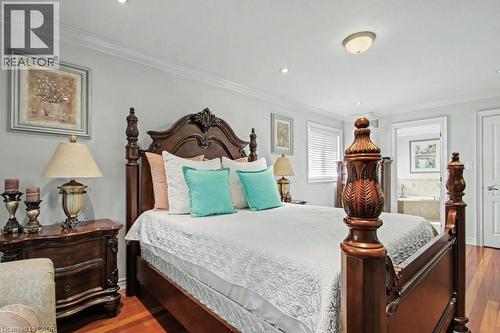 Bedroom with crown molding, wood finished floors, and recessed lighting - 284 Normanhurst Avenue, Hamilton, ON - Indoor Photo Showing Bedroom