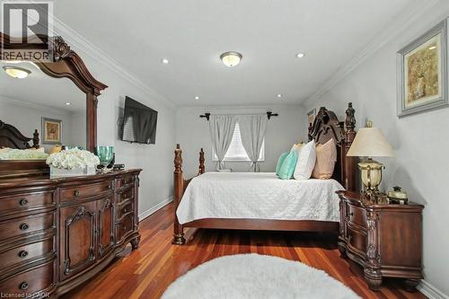 Bedroom featuring wood finished floors, crown molding, and recessed lighting - 284 Normanhurst Avenue, Hamilton, ON - Indoor Photo Showing Bedroom
