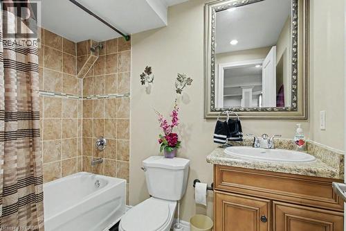 Full bath with vanity and shower / tub combo with curtain - 284 Normanhurst Avenue, Hamilton, ON - Indoor Photo Showing Bathroom