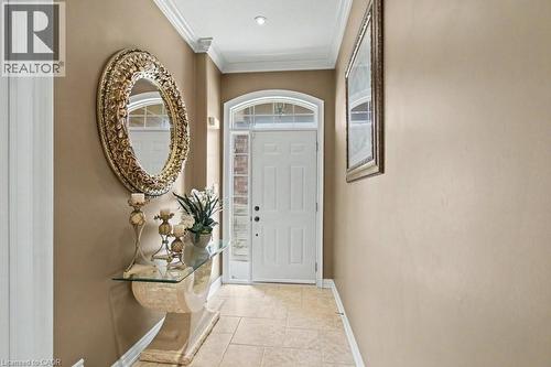 Foyer with ornamental molding and baseboards - 284 Normanhurst Avenue, Hamilton, ON - Indoor Photo Showing Other Room