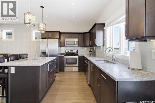 23 111 Rosewood Gate N, Saskatoon, SK - Indoor Photo Showing Kitchen With Stainless Steel Kitchen With Double Sink With Upgraded Kitchen