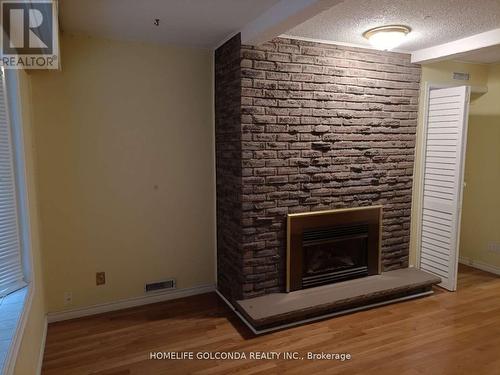 2475 Council Ring Road, Mississauga, ON - Indoor Photo Showing Living Room With Fireplace