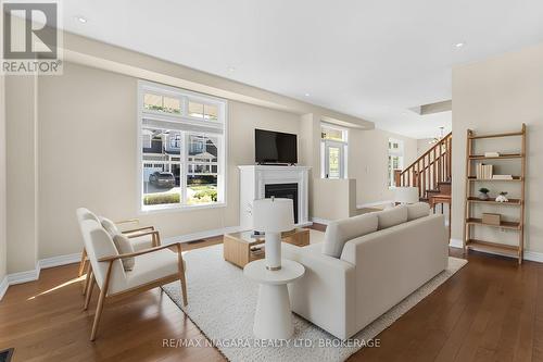 750 Lakeshore Road, Fort Erie (Lakeshore), ON - Indoor Photo Showing Living Room With Fireplace