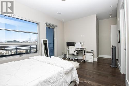 208 - 1705 Fiddlehead Place, London North (North R), ON - Indoor Photo Showing Bedroom
