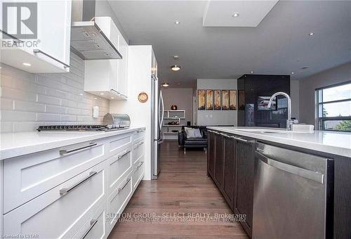 208 - 1705 Fiddlehead Place, London North (North R), ON - Indoor Photo Showing Kitchen With Upgraded Kitchen
