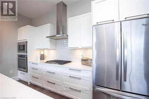 208 - 1705 Fiddlehead Place, London North (North R), ON - Indoor Photo Showing Kitchen With Upgraded Kitchen