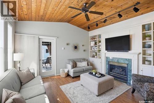 106 Laurentian Drive, Saskatoon, SK - Indoor Photo Showing Living Room With Fireplace