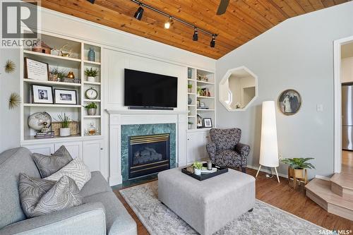 106 Laurentian Drive, Saskatoon, SK - Indoor Photo Showing Living Room With Fireplace