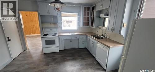 703 Main Street, Kipling, SK - Indoor Photo Showing Kitchen With Double Sink