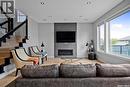4311 Sandpiper Crescent E, Regina, SK  - Indoor Photo Showing Living Room With Fireplace 