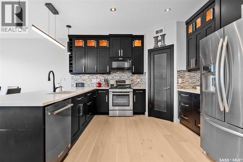 4311 Sandpiper Crescent E, Regina, SK - Indoor Photo Showing Kitchen With Stainless Steel Kitchen With Upgraded Kitchen