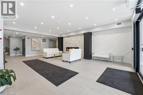 Lobby featuring recessed lighting - 120 Springvalley Crescent Unit# 203, Hamilton, ON - Indoor Photo Showing Other Room