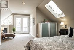 Primary Bedroom With Doors To Deck + Hot Tub - 