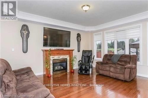 78 Assisi Street, Hamilton, ON - Indoor Photo Showing Living Room With Fireplace